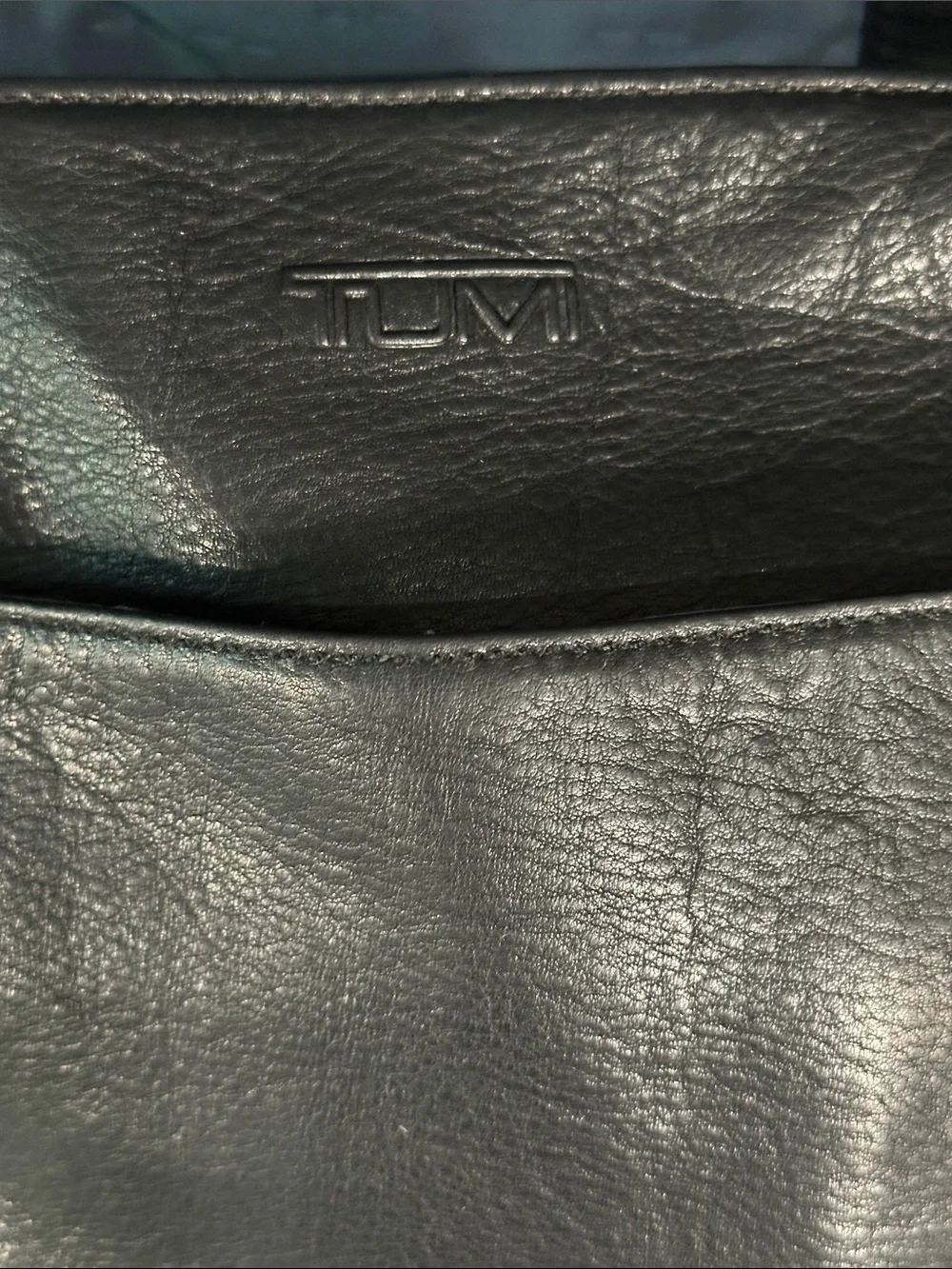 Tumi Black Leather Messenger Bag with Adjustable Strap